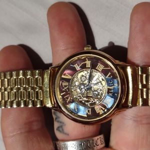 Vintage Relic Watch with Roman Numerals and Skeleton Face.